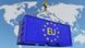 A generic picture of a container bearing the EU flag and lifted by a crane