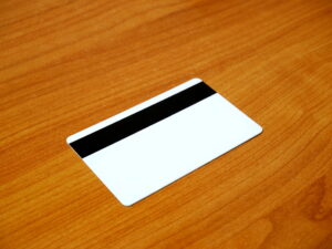 Blank back of a generic payment card showing the magnetic stripe, with no visible brand markings